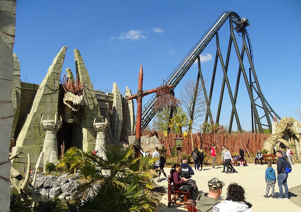 Walibi Belgium theme park with rides and green landscaping
